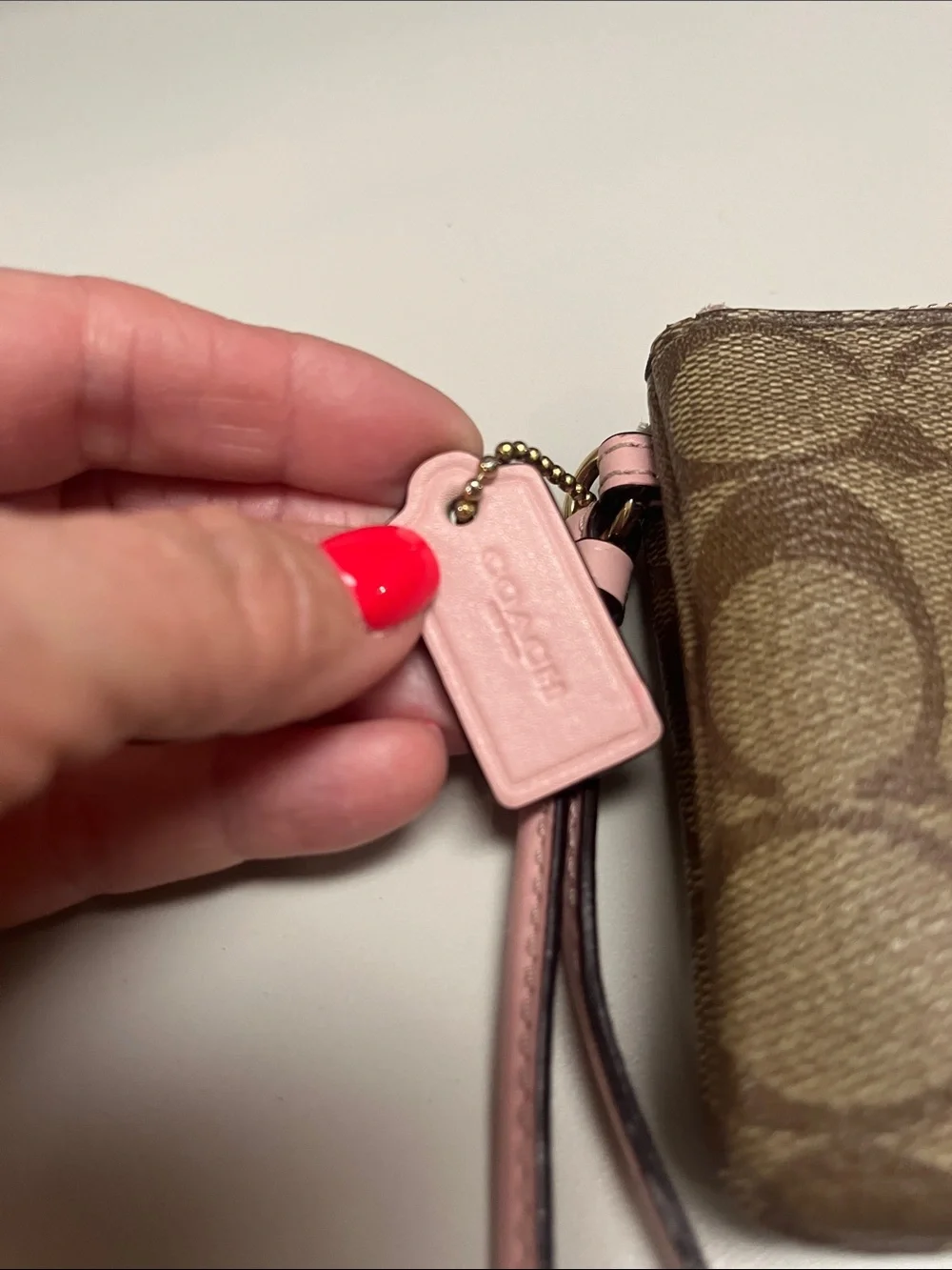 Coach Brown Signature Canvas Wristlet with Pink Trim